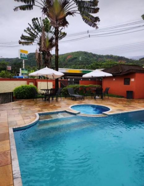 Flat em Juquehy - Condomínio com portaria e com piscina próximo praia